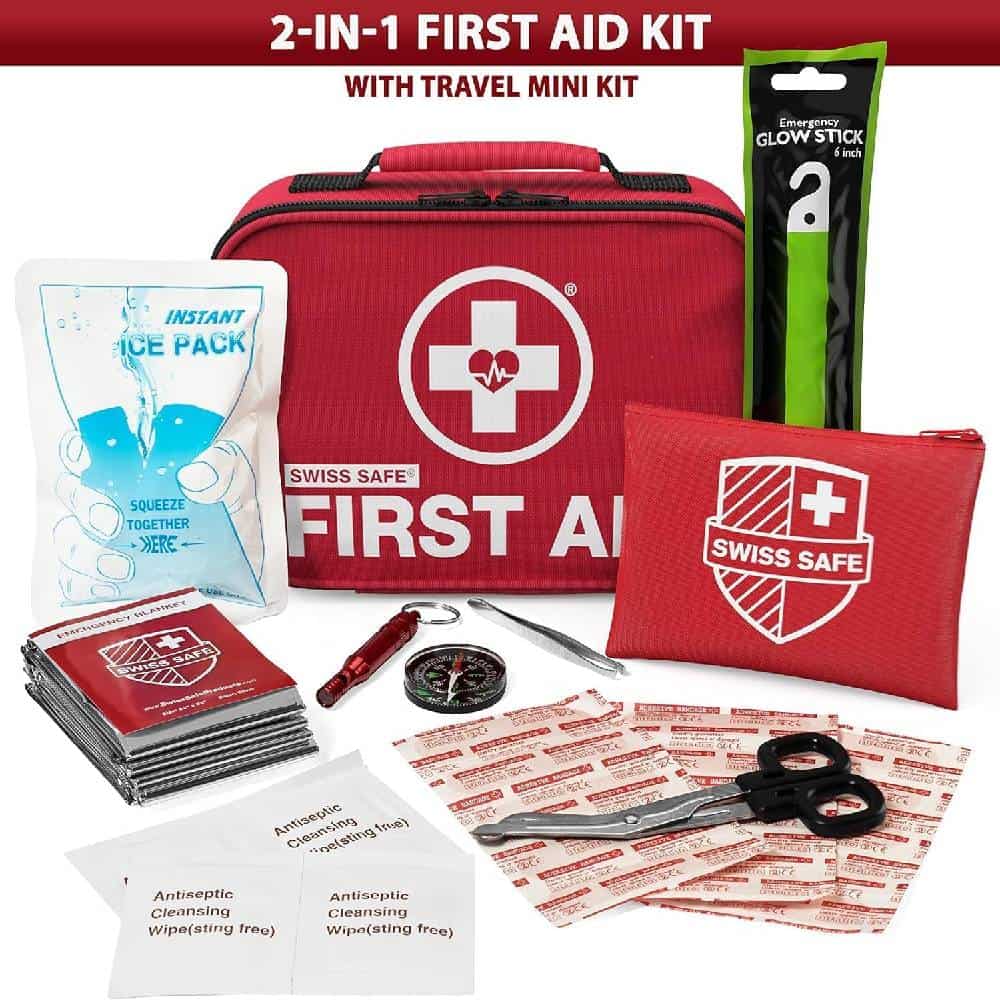First aid kit with travel mini kit, essential emergency medical supplies, and first aid tools for outdoor survival and disaster preparedness.