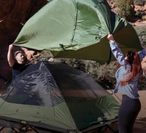 Waterproof tent for camping in rain, outdoor adventure gear, rainproof camping tent for wilderness expeditions, durable rainfly for tents in wet weather, outdoor survival gear.