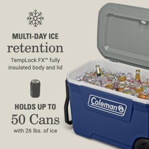 Durable Blue Coleman cooler with ice for outdoor survival and camping.