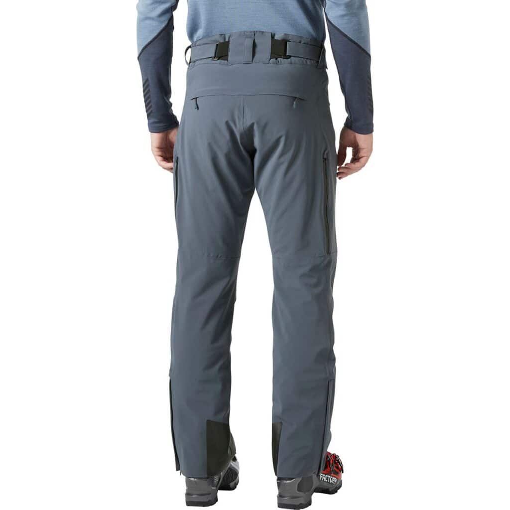 Adjustable outdoor tactical pants with multiple zipper pockets and reinforced areas, ideal for hiking, camping, and survival activities. Durable, comfortable, and weather-resistant for rugged environments.