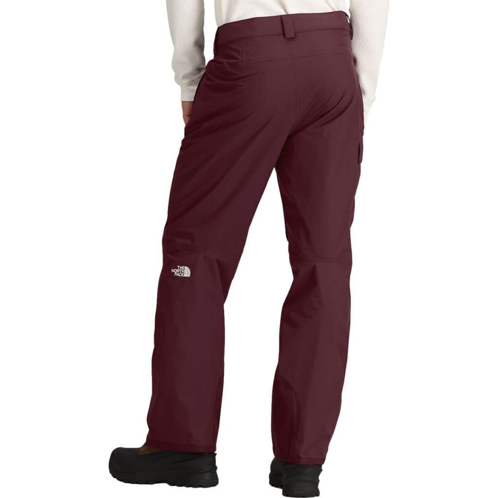 Warm outdoor tactical pants, The North Face durable waterproof hiking pants with adjustable waist and multiple pockets, designed for hiking, camping, and survival adventures.