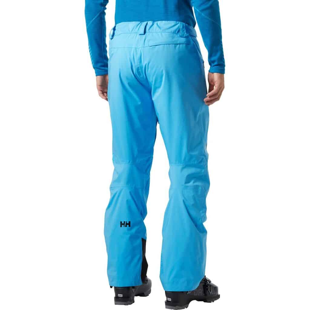 Waterproof blue outdoor hiking pants with reinforced knee panels and adjustable waistband, ideal for wilderness survival and adventure gear.