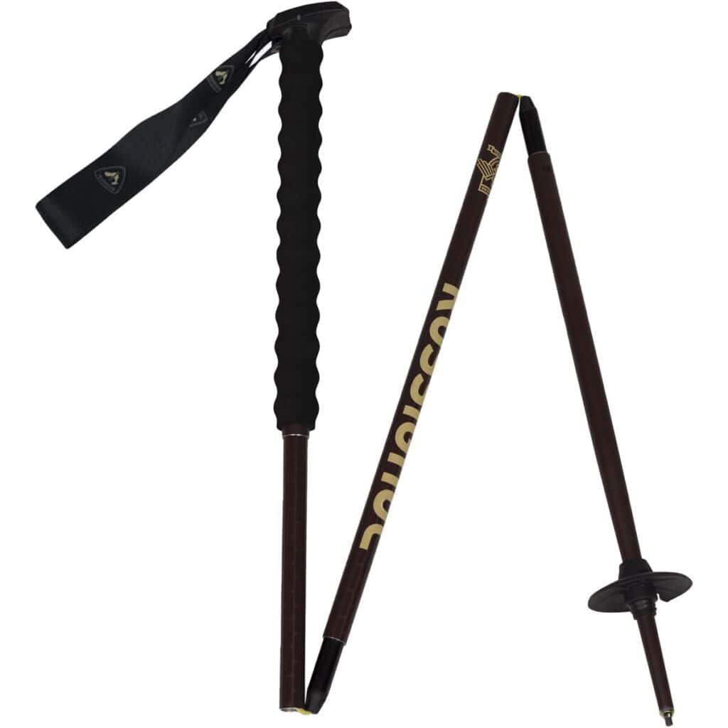 Aluminum trekking pole with ergonomic handle and adjustable strap for hiking and outdoor adventures. Lightweight, durable, and essential survival gear for trekking and camping enthusiasts.