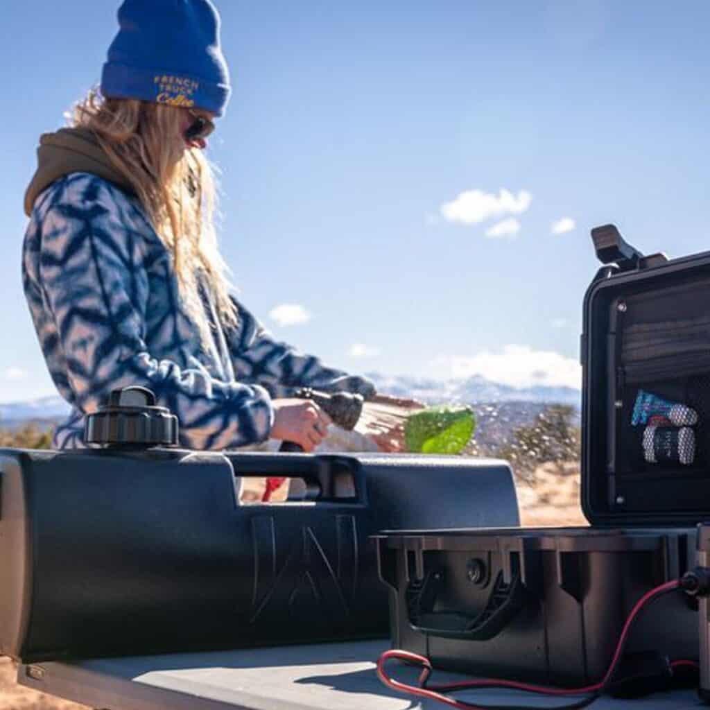 Portable camping water filter for outdoor survival and emergency preparedness.