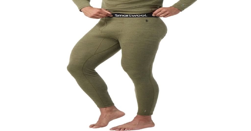 Comfortable olive green thermal leggings for outdoor survival, hiking, and camping; anti-chafe, moisture-wicking, and great for layering in extreme weather conditions.